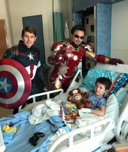 superhero charity comic book donations to children's hospital